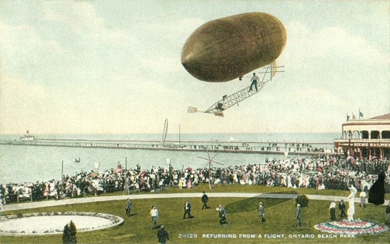 Old postcard image of a blimp at the shoreline of Lake Ontario