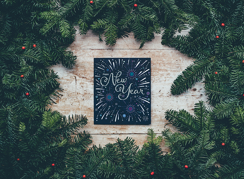 Chalk board with "New Year" written on it