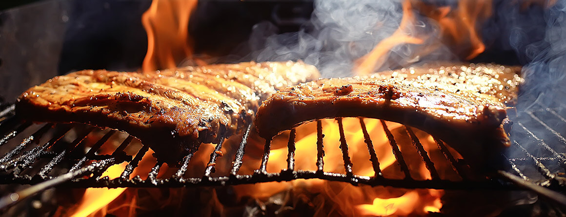 Ribs cooking on a grill