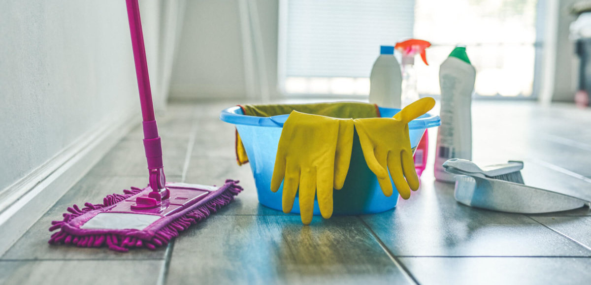 Dust mop, bucket, cleaning gloves, and spray cleaner