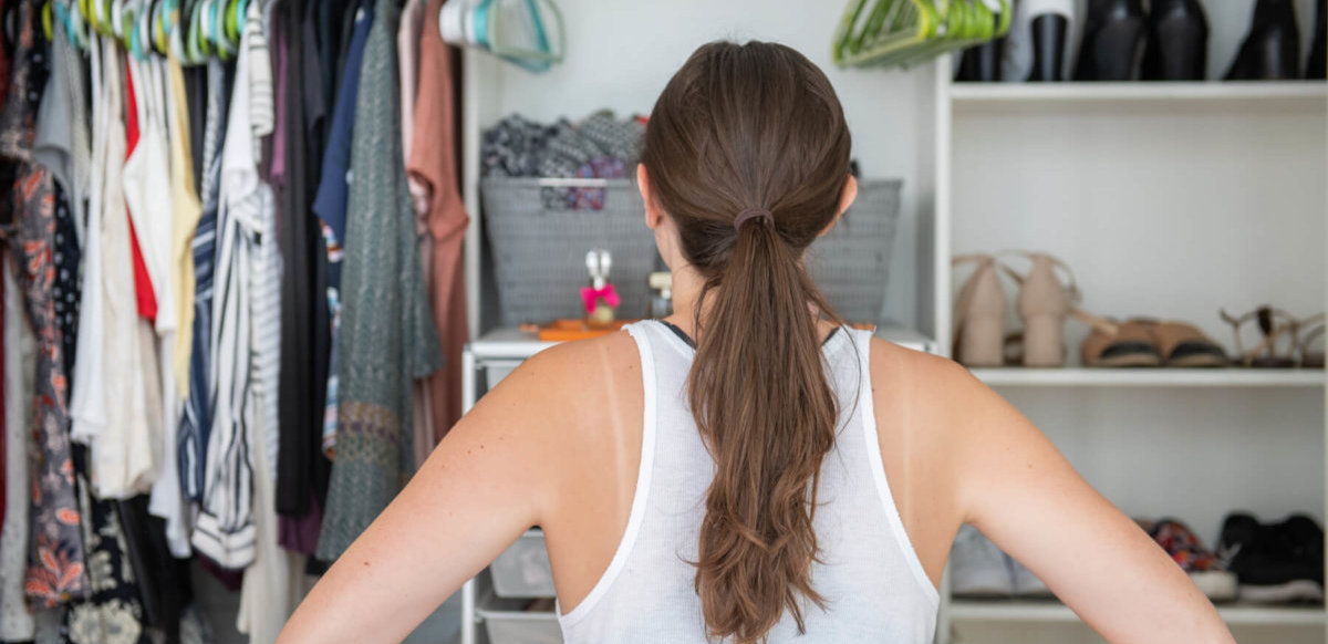 Woman looking at her closet