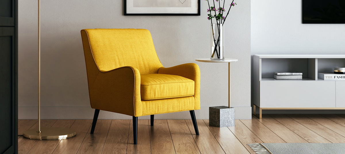 Yellow chair in living room. Image credit: Kam Idris
