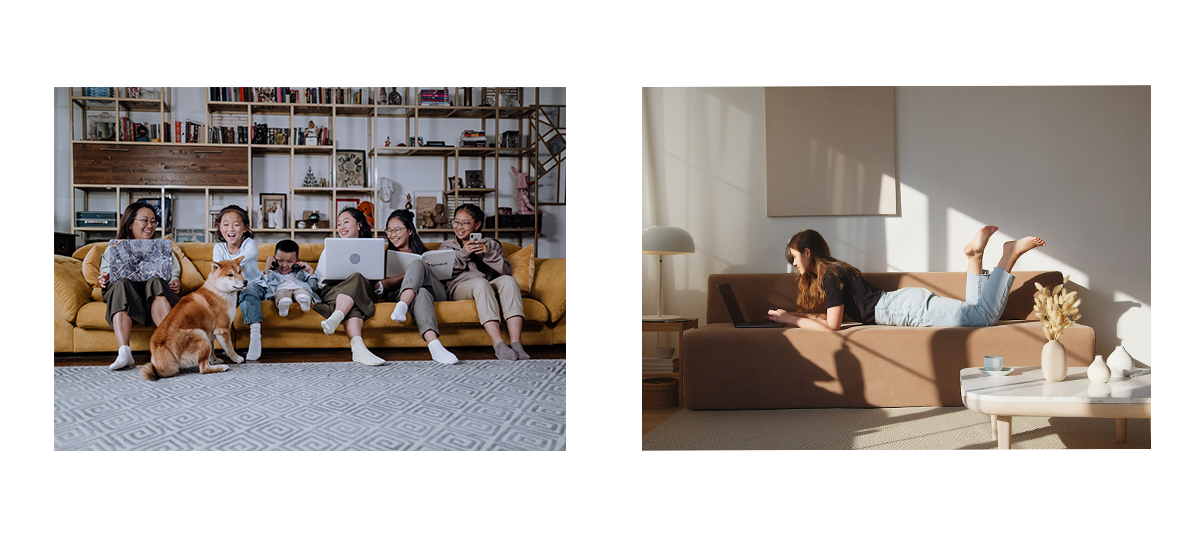 A family sitting on a sofa and a woman lounging on a couch.