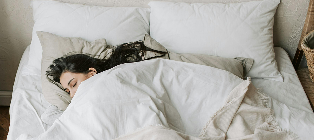 Woman sleeping in bed